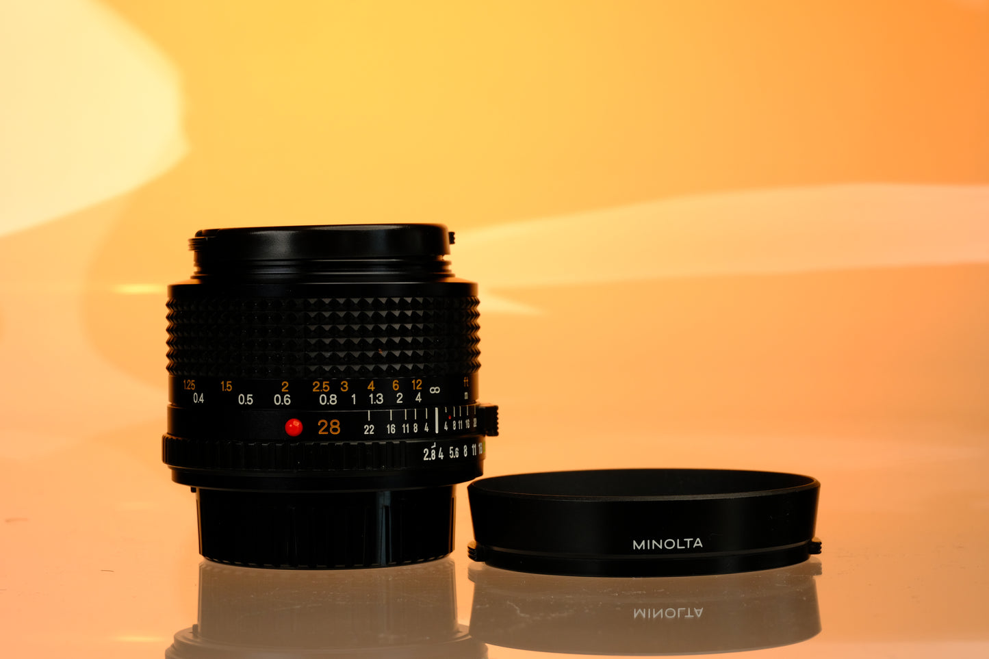 Minolta 28mm f/2.8 Lens + Hood