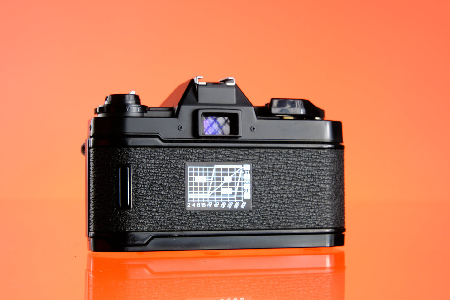 Nikon EM 35mm SLR + 60-200mm F/4-5.6