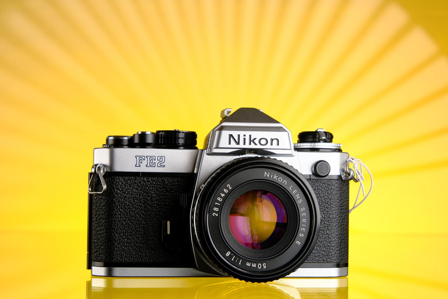Nikon FE2 Silver 35mm SLR Film camera + 50mm F/1.8 Series E Lens Tested Working!