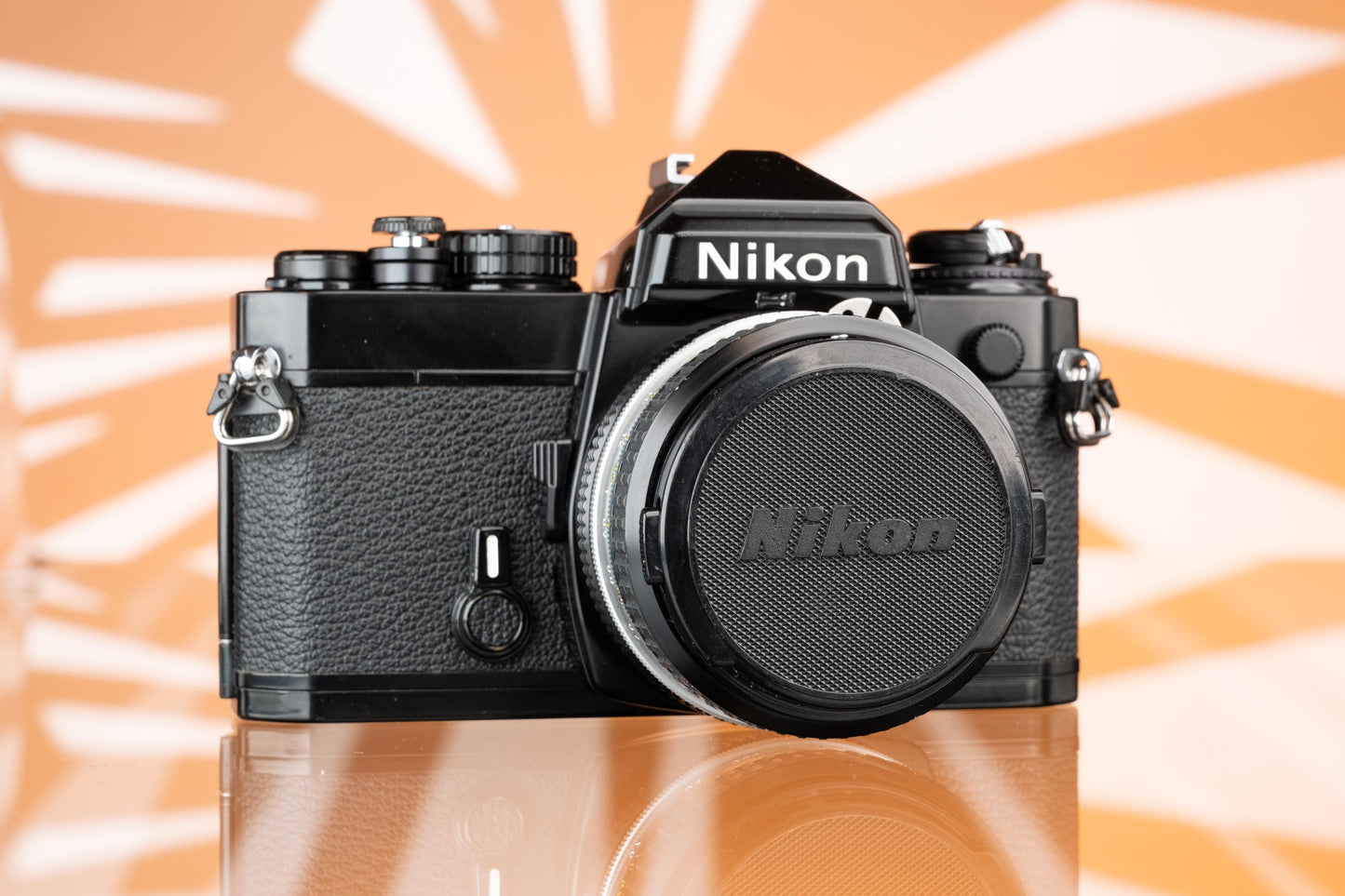 Nikon FE Black 35mm SLR + Nikon Nikkor 50mm f/1.8 Ai Lens