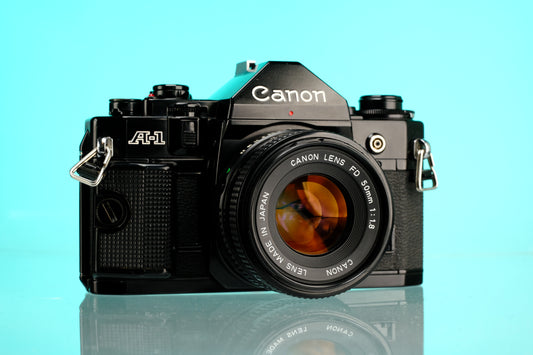 Canon A-1 35mm SLR Film Camera + 50mm f/1.8 nFD Lens