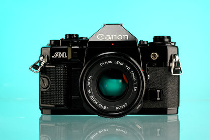 Canon A-1 35mm SLR Film Camera + 50mm f/1.8 nFD Lens
