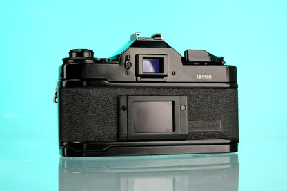Canon A-1 35mm SLR Film Camera + 50mm f/1.8 nFD Lens