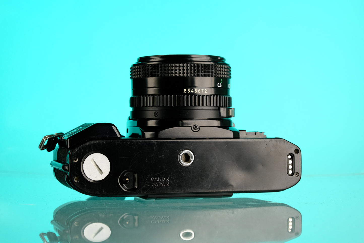 Canon A-1 35mm SLR Film Camera + 50mm f/1.8 nFD Lens