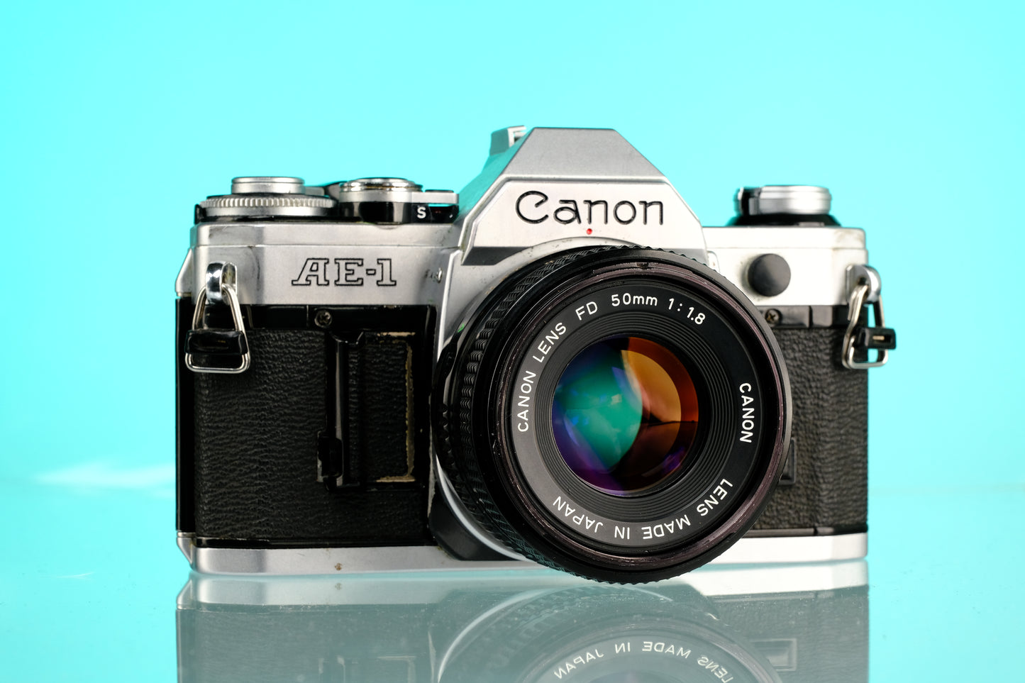 Canon AE-1 35mm SLR Film Camera + 50mm f/1.8 nFD Lens