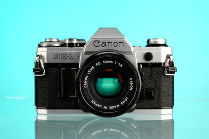 Canon AE-1 35mm SLR Film Camera + 50mm f/1.8 nFD Lens