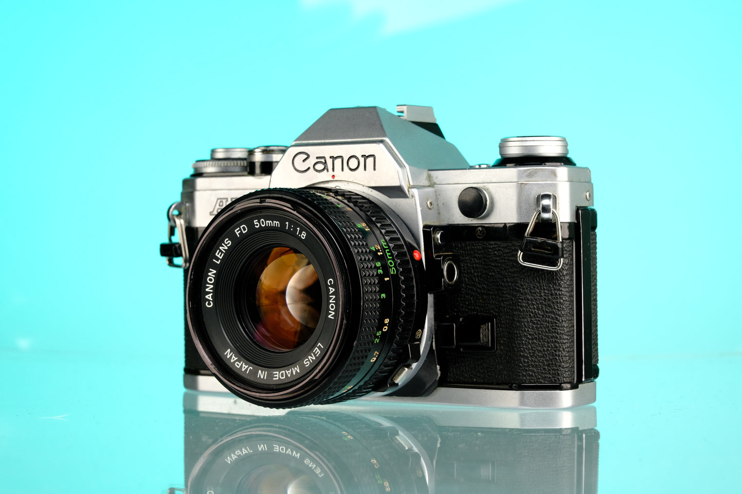 Canon AE-1 35mm SLR Film Camera + 50mm f/1.8 nFD Lens