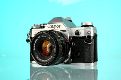 Canon AE-1 35mm SLR Film Camera + 50mm f/1.8 nFD Lens