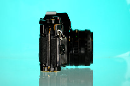 Canon A-1 35mm SLR Film Camera + 50mm f/1.8 Lens