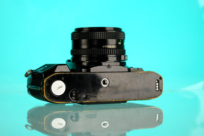 Canon A-1 35mm SLR Film Camera + 50mm f/1.8 Lens