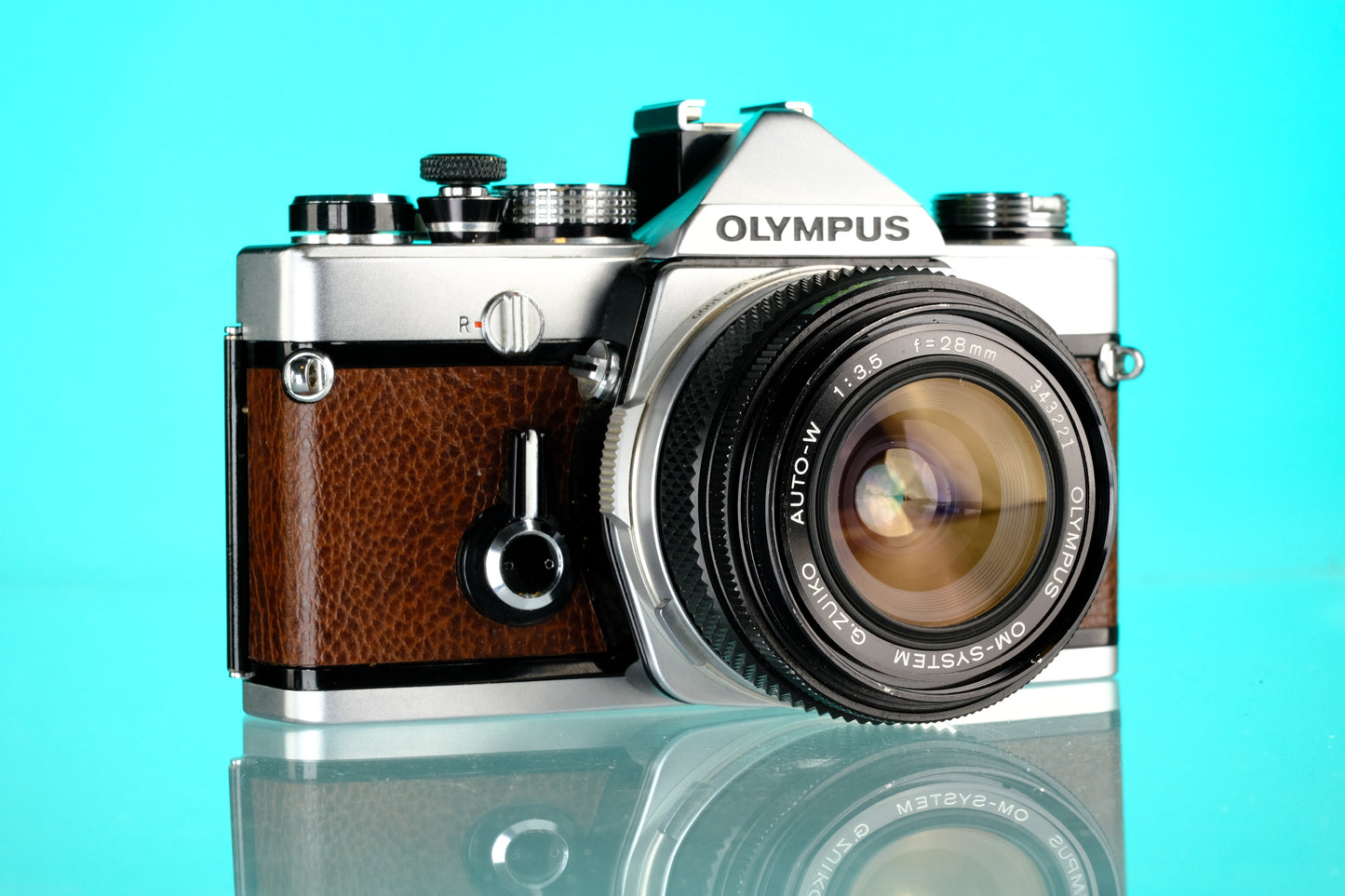 Olympus OM-1 35mm SLR + 28mm f/3.5 Auto W Wide Angle Lens