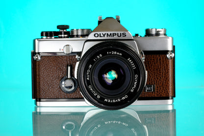 Olympus OM-1 35mm SLR + 28mm f/3.5 Auto W Wide Angle Lens