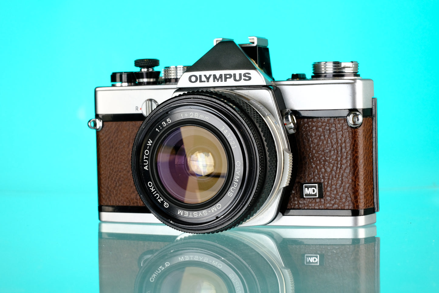 Olympus OM-1 35mm SLR + 28mm f/3.5 Auto W Wide Angle Lens