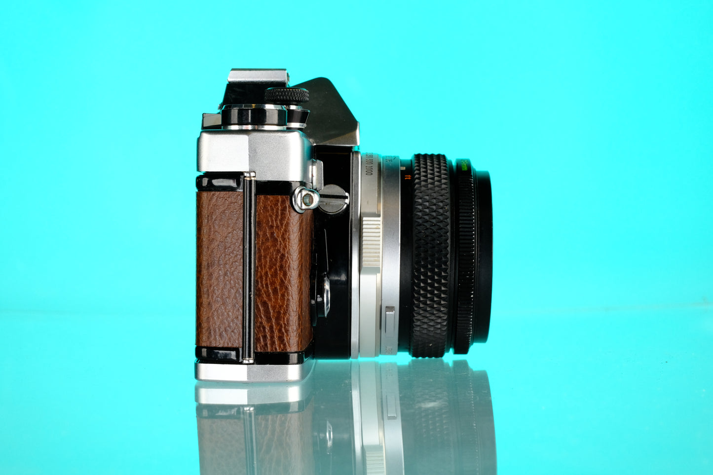 Olympus OM-1 35mm SLR + 28mm f/3.5 Auto W Wide Angle Lens