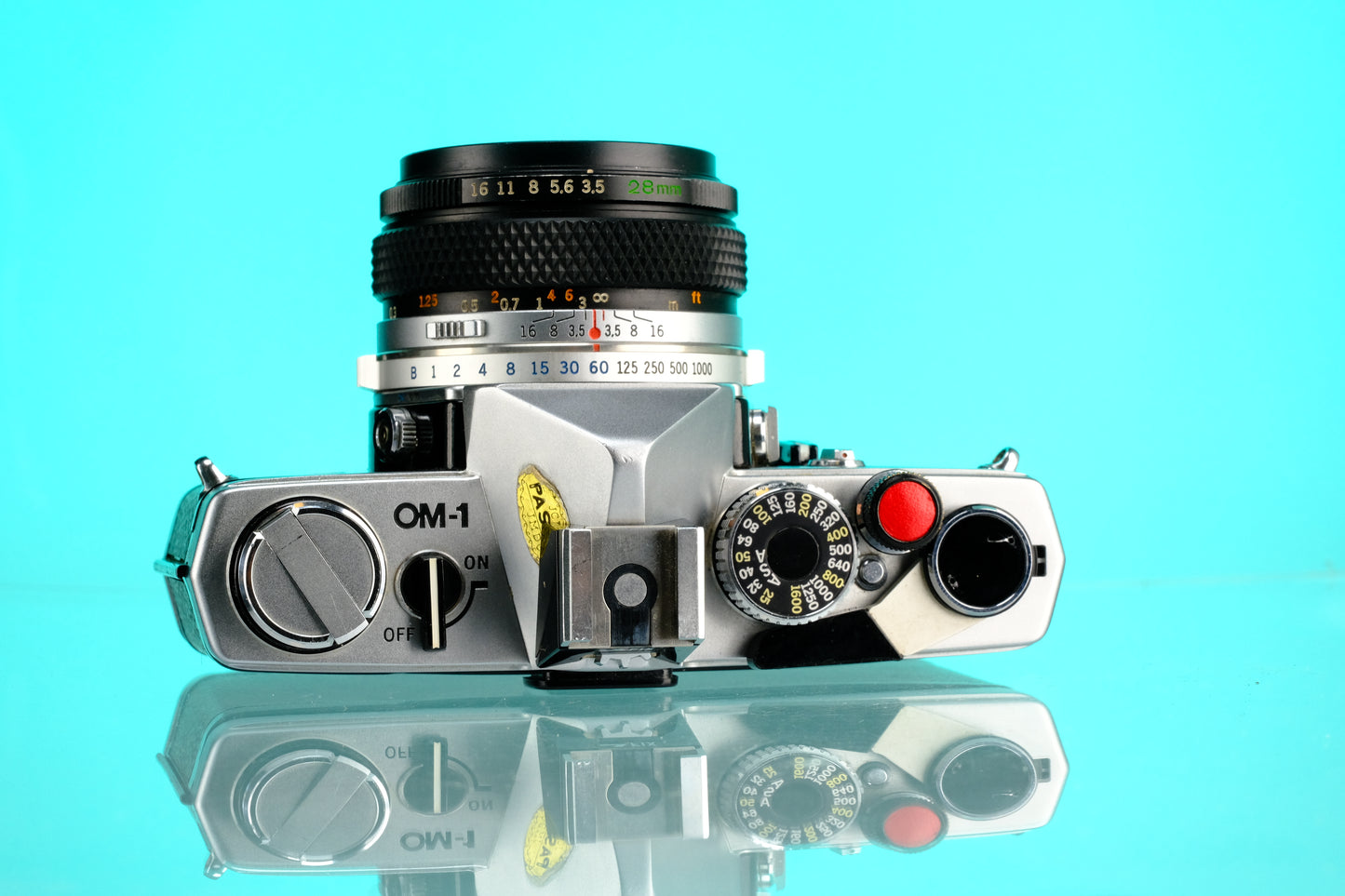Olympus OM-1 35mm SLR + 28mm f/3.5 Auto W Wide Angle Lens