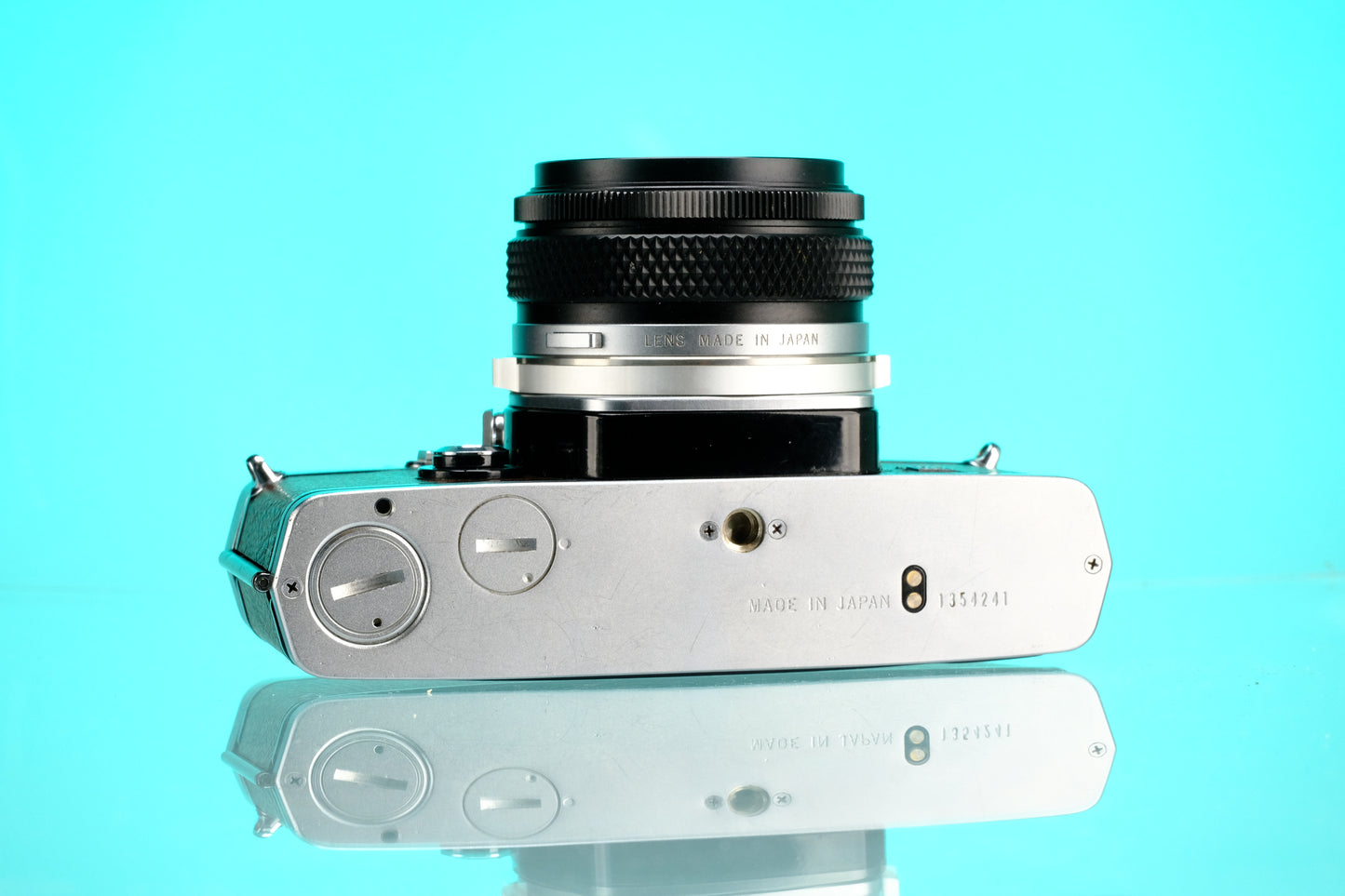 Olympus OM-1 35mm SLR + 28mm f/3.5 Auto W Wide Angle Lens