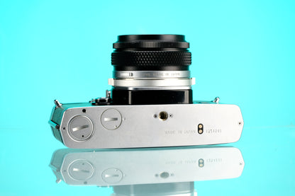 Olympus OM-1 35mm SLR + 28mm f/3.5 Auto W Wide Angle Lens