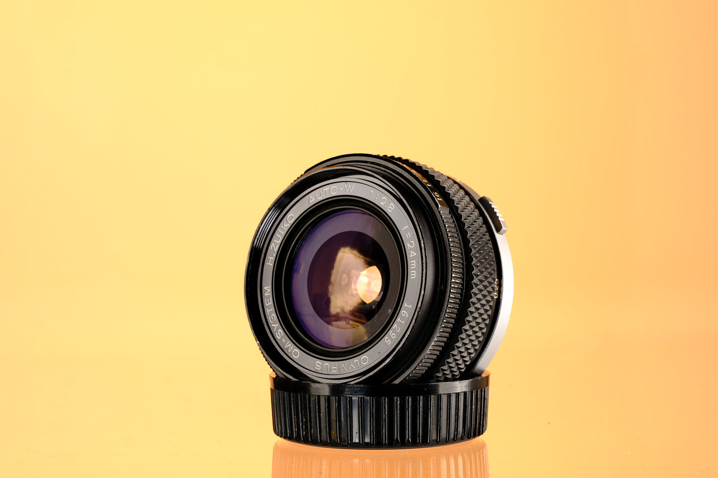 Olympus 24mm f/2.8 Auto-W H.Zuiko Lens