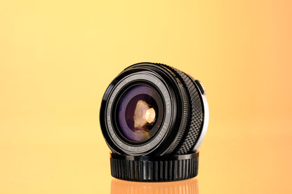 Olympus 24mm f/2.8 Auto-W H.Zuiko Lens