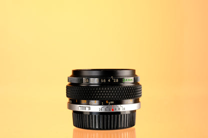Olympus 24mm f/2.8 Auto-W H.Zuiko Lens