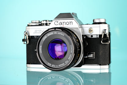 Canon AE-1 35mm SLR Film Camera + 50mm f/1.8 FD Lens