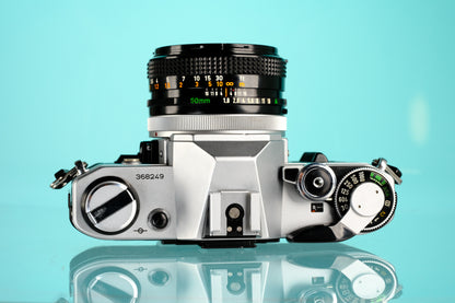 Canon AE-1 35mm SLR Film Camera + 50mm f/1.8 FD Lens