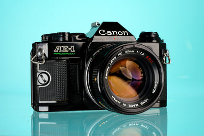 Canon AE-1 Program 35mm SLR Film Camera + 50mm f/1.4 S.S.C Lens