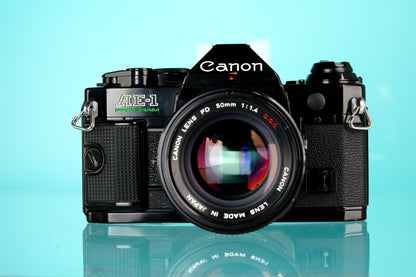 Canon AE-1 Program 35mm SLR Film Camera + 50mm f/1.4 S.S.C Lens