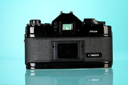 Canon A-1 35mm SLR Film Camera + 50mm f/1.4 S.S.C Lens