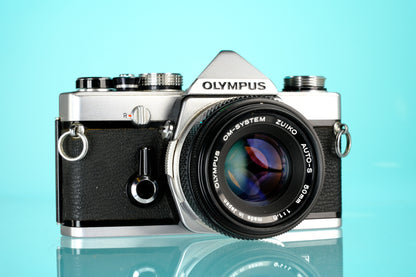Olympus OM-1 35mm SLR Film Camera + 50mm f/1.8 Lens