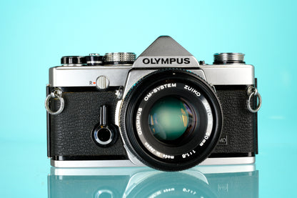 Olympus OM-1 35mm SLR Film Camera + 50mm f/1.8 Lens