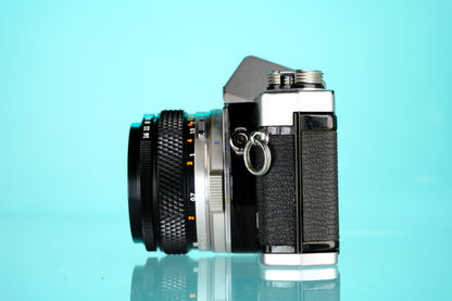 Olympus OM-1 35mm SLR Film Camera + 50mm f/1.8 Lens