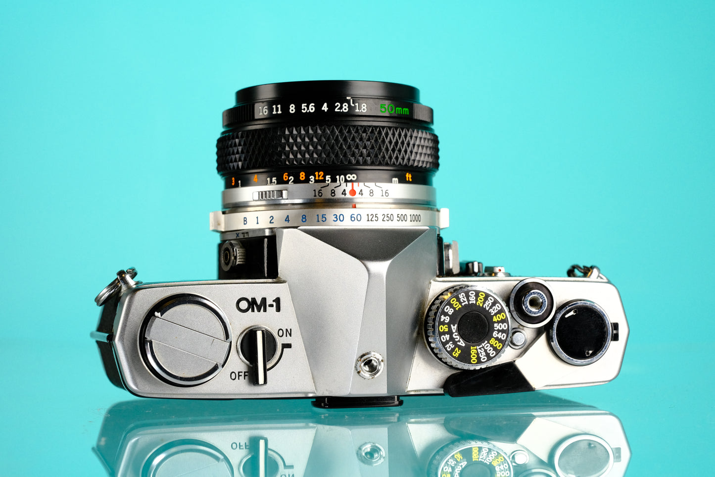 Olympus OM-1 35mm SLR Film Camera + 50mm f/1.8 Lens