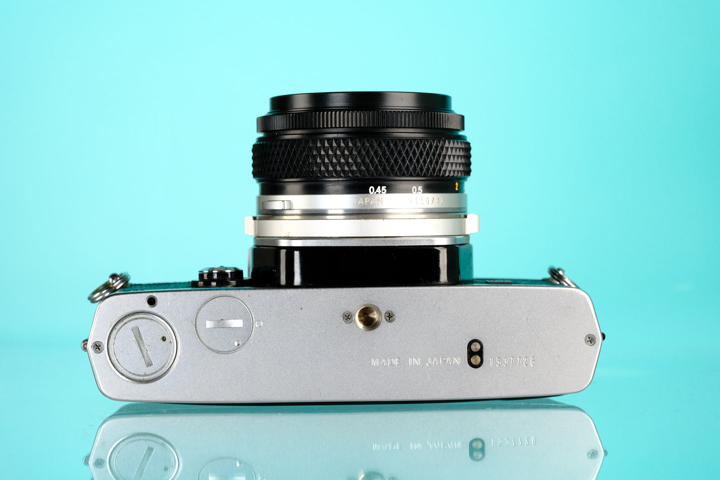 Olympus OM-1 35mm SLR Film Camera + 50mm f/1.8 Lens