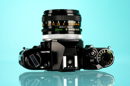 Canon AE-1 35mm SLR Film Camera + 50mm f/1.8 S.C FD Lens