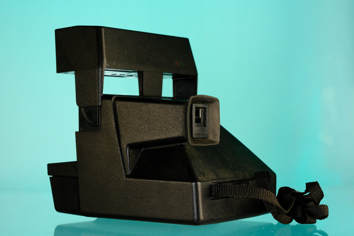 Polaroid One Step Flash Instant Film Camera