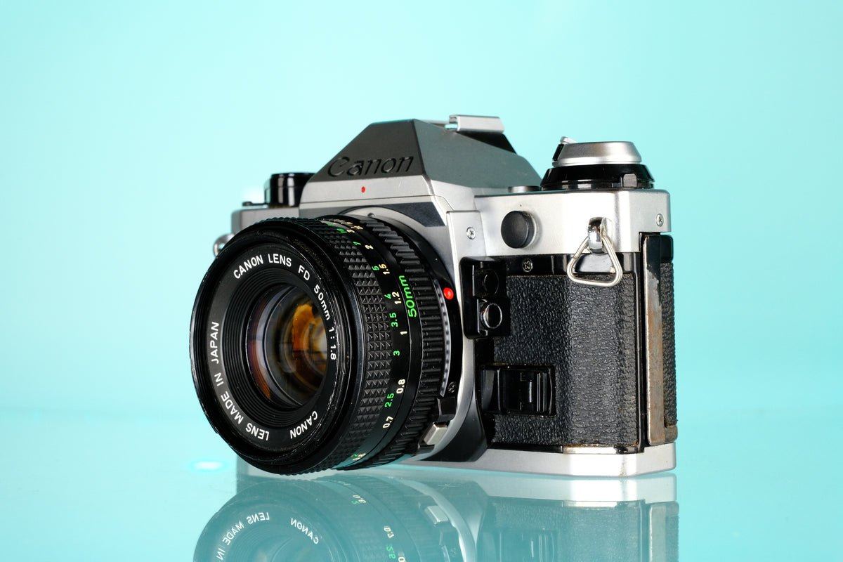 Canon AE-1 Program 35mm SLR Film Camera + Canon 50mm f/1.8 FD Lens