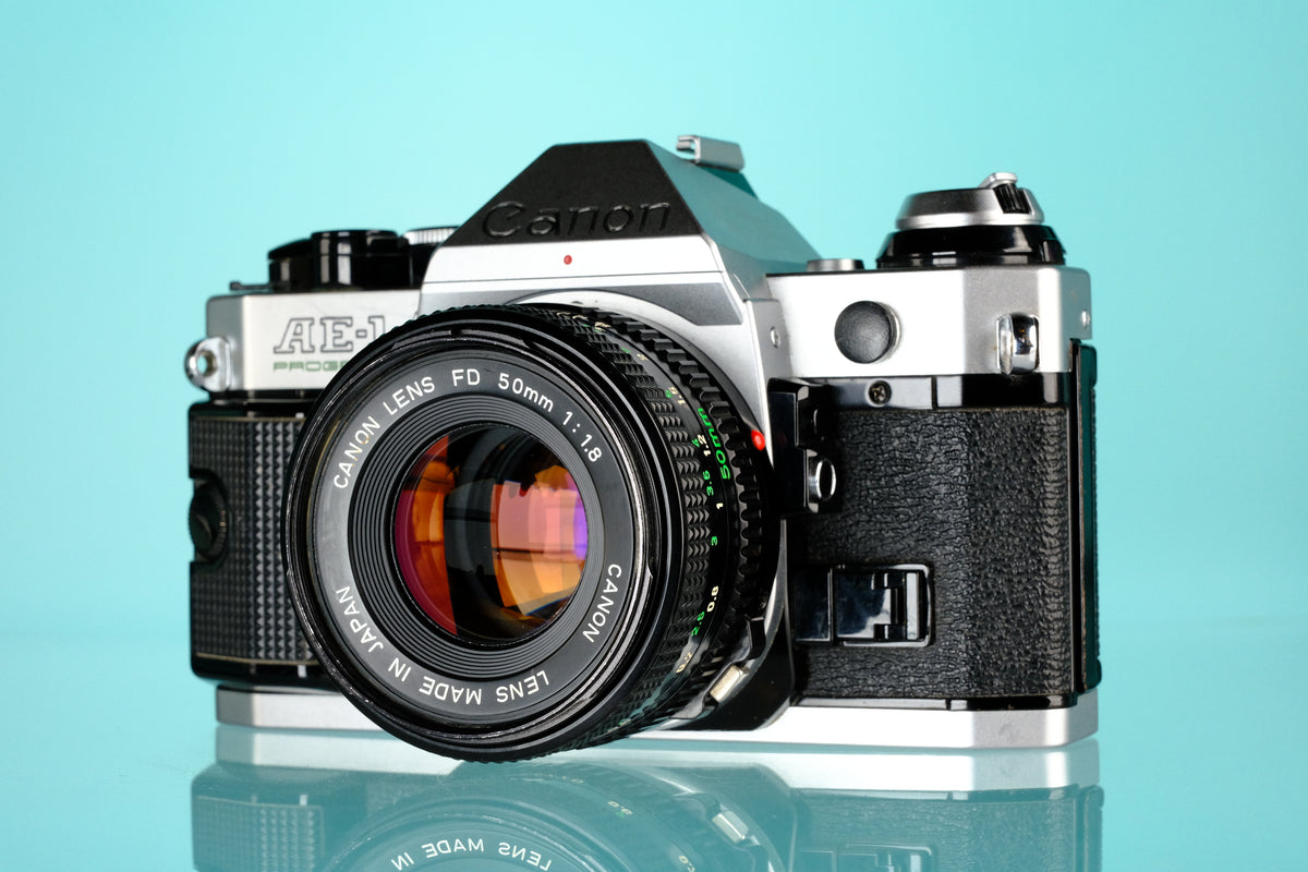 Canon AE-1 Program 35mm SLR Film Camera + 50mm f/1.8 Lens