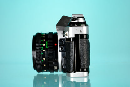 Canon AE-1 Program 35mm SLR Film Camera + 50mm f/1.8 Lens