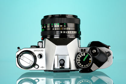 Canon AE-1 Program 35mm SLR Film Camera + 50mm f/1.8 Lens