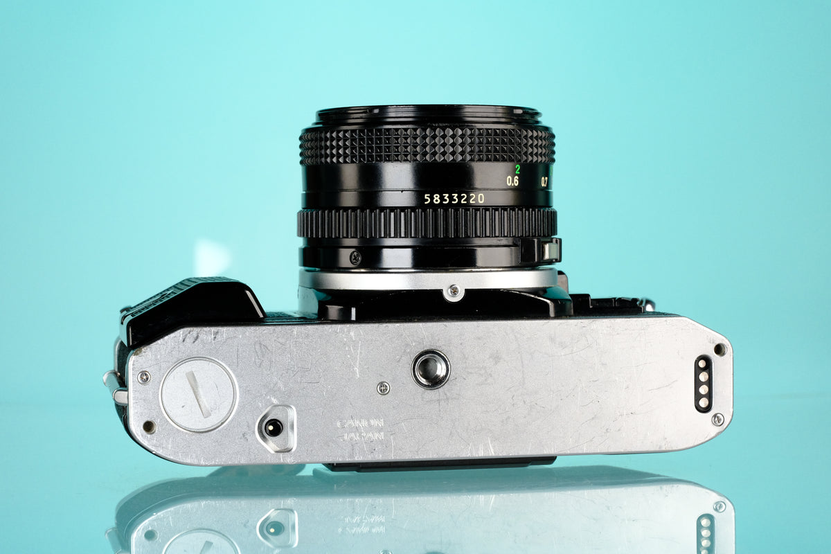 Canon AE-1 Program 35mm SLR Film Camera + 50mm f/1.8 Lens