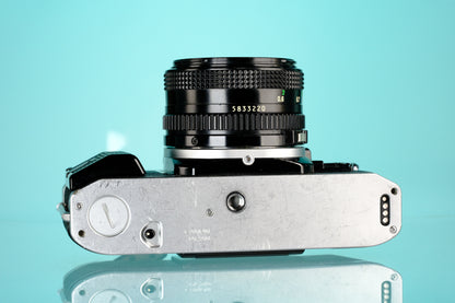 Canon AE-1 Program 35mm SLR Film Camera + 50mm f/1.8 Lens