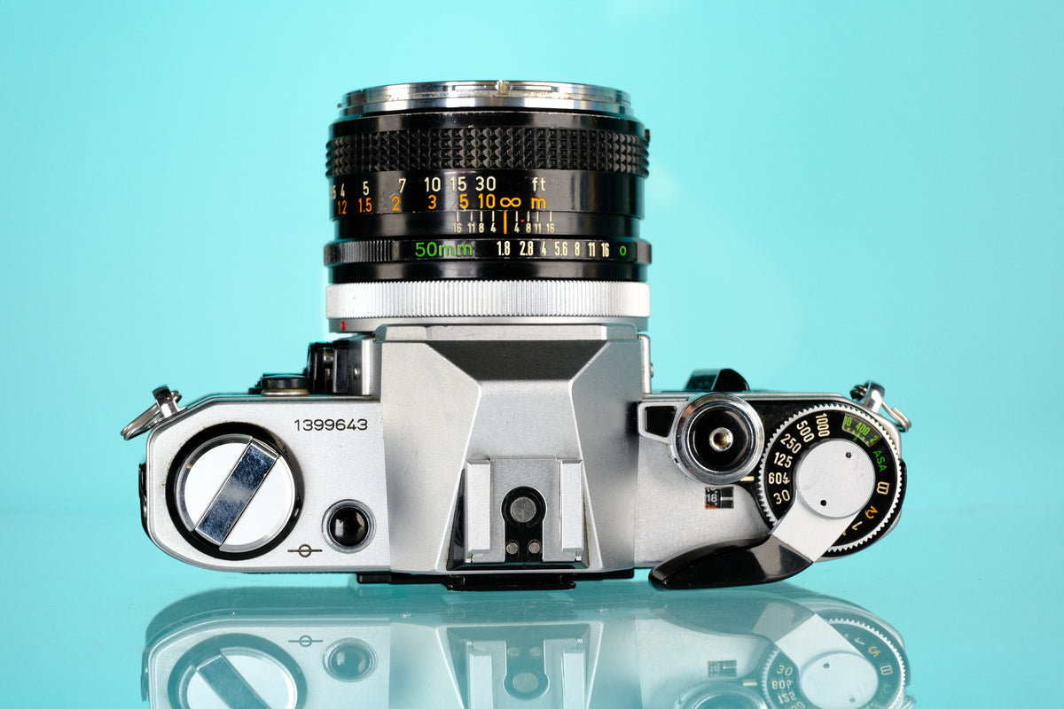 Canon AE-1 35mm SLR Film Camera + 50mm f/1.8 Lens