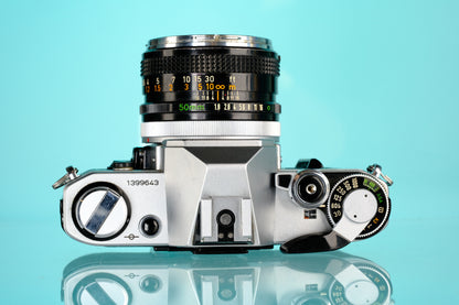 Canon AE-1 35mm SLR Film Camera + 50mm f/1.8 Lens