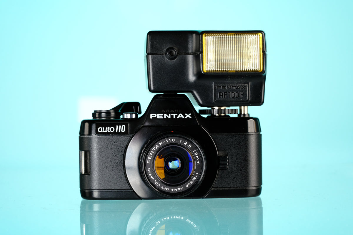 Pentax Auto 110 + 18mm f/2.8 Lens + AF100 P Flash