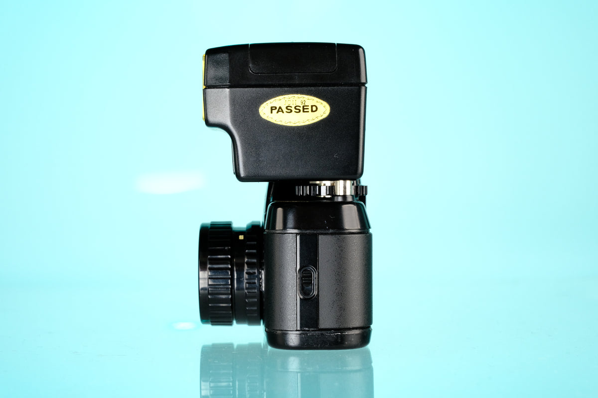 Pentax Auto 110 + 18mm f/2.8 Lens + AF100 P Flash