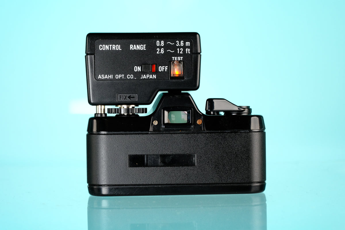 Pentax Auto 110 + 18mm f/2.8 Lens + AF100 P Flash