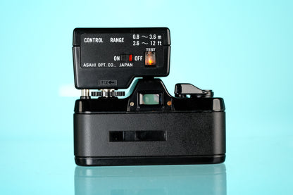 Pentax Auto 110 + 18mm f/2.8 Lens + AF100 P Flash