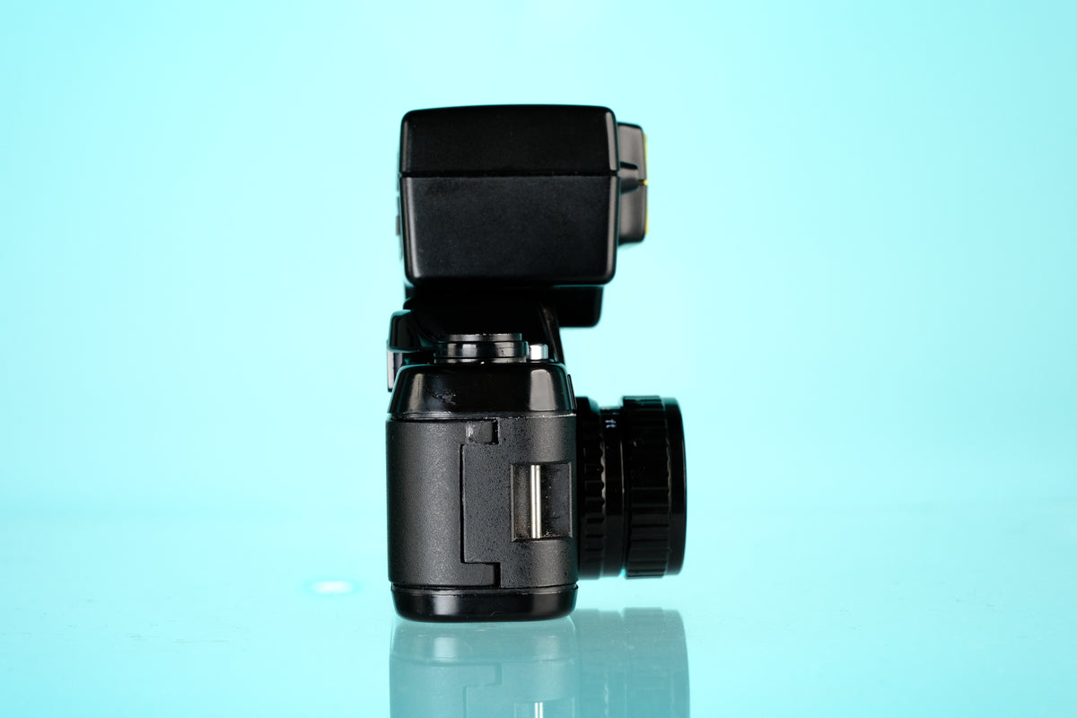 Pentax Auto 110 + 18mm f/2.8 Lens + AF100 P Flash