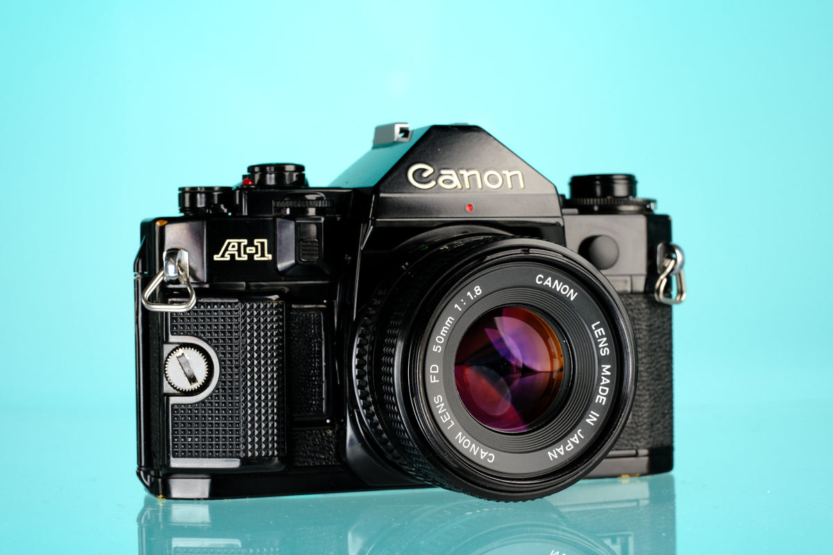 Canon A-1 35mm SLR Film Camera + 50mm f/1.8 nFD Lens